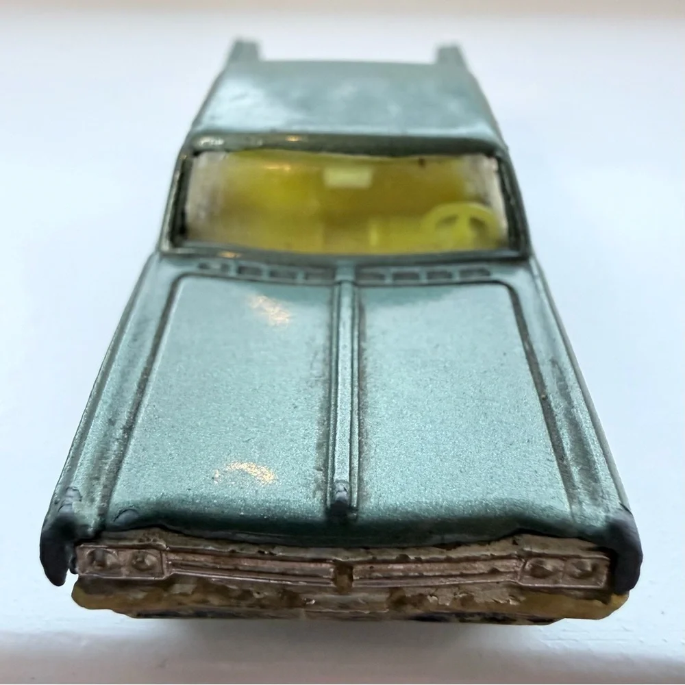 Vintage Husky Oldsmobile Starfire Coupe die-cast toy car rare green